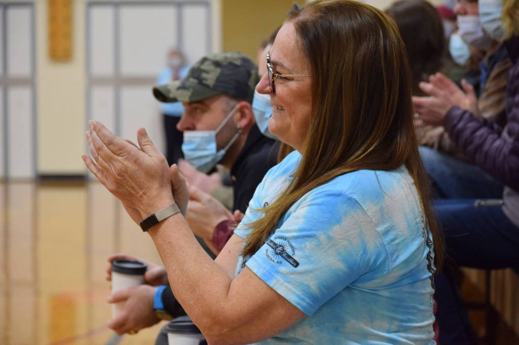 Teacher Terri Carter celebrates the National Blue Ribbon award during an assembly at Soldotna Montessori Charter School on Friday, Jan 14, 2022. (Camille Botello / Peninsula Clarion)