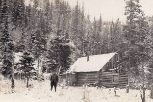 Robert Bob Huttle, posing here next to Cliff House, spent the night in this cabin in April 1934 and mused about a possible murder there. (Photo courtesy of the Huttle Collection)
