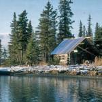 Cliff House in November 1965. The cabin was constructed on this sandy point of land near the terminus of the Tustumena Glacier outwash plain. (Photo courtesy of the Fair Family Collection)