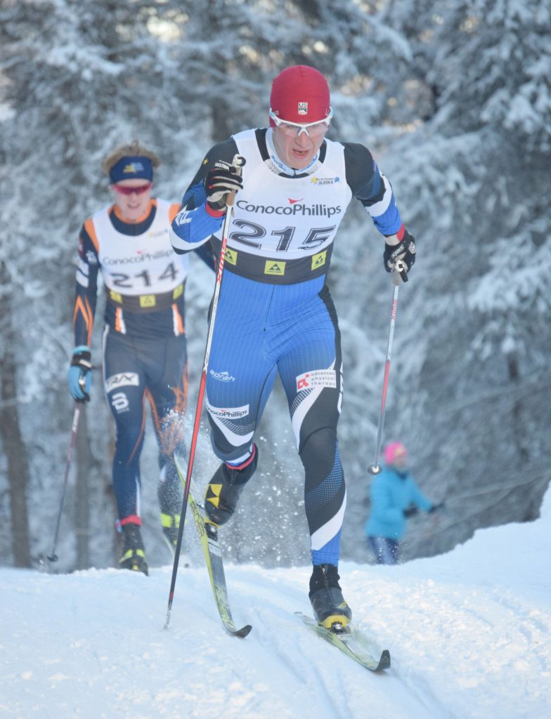 Karl Danielson, a 2018 graduate of Kenai Central, races to victory in the Under-18 and over mens 10-kilometer interval start classic at Besh Cup 4 on Sunday, Jan. 16, 2022, at Tsalteshi Trails just outside of Soldotna, Alaska. The Besh Cup races are mostly used to select skiers for Junior Nationals, but also give younger and older skiers a chance for top-notch racing. It took over 50 volunteers to put together the two days of races, which had over 200 skiers each day. (Photo by Jeff Helminiak/Peninsula Clarion)