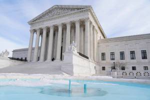The U.S. Supreme Court on Wednesday, Jan.19, 2022, in Washington. In a rebuff to former President Donald Trump, the Supreme Court is allowing the release of presidential documents sought by the congressional committee investigating the Jan. 6 insurrection. (AP Photo/Mariam Zuhaib)