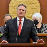Gov. Mike Dunleavy speaks to a joint meeting of the Alaska State Legislature at the Alaska State Capitol on Tuesday, Jan. 25, 2022, for his fourth State of the State address of his administration. Dunleavy painted a positive picture for the state despite the challenges Alaska has faced during the COVID-19 pandemic and its effects on the economy. (Peter Segall / Juneau Empire)