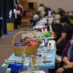 Community agencies administer social services to those in need during the Project Homeless Connect event Soldotna Regional Sports Complex in Soldotna on Wednesday, Jan. 26, 2022. (Camille Botello/Peninsula Clarion)