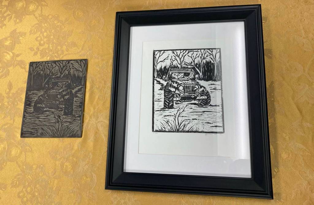 A print is on display at the Kenai Art Center on Monday, Jan. 31, 2022. (Camille Botello/Peninsula Clarion)