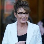 Sarah Palin leaves the courthouse in New York, Thursday, Feb. 10, 2022. Former Alaska Gov. Sarah Palin told a jury Thursday she felt like she was at the mercy of a “Goliath” when she first learned a 2017 New York Times editorial suggested her campaign rhetoric helped incite a mass shooting.. (AP Photo/Seth Wenig)