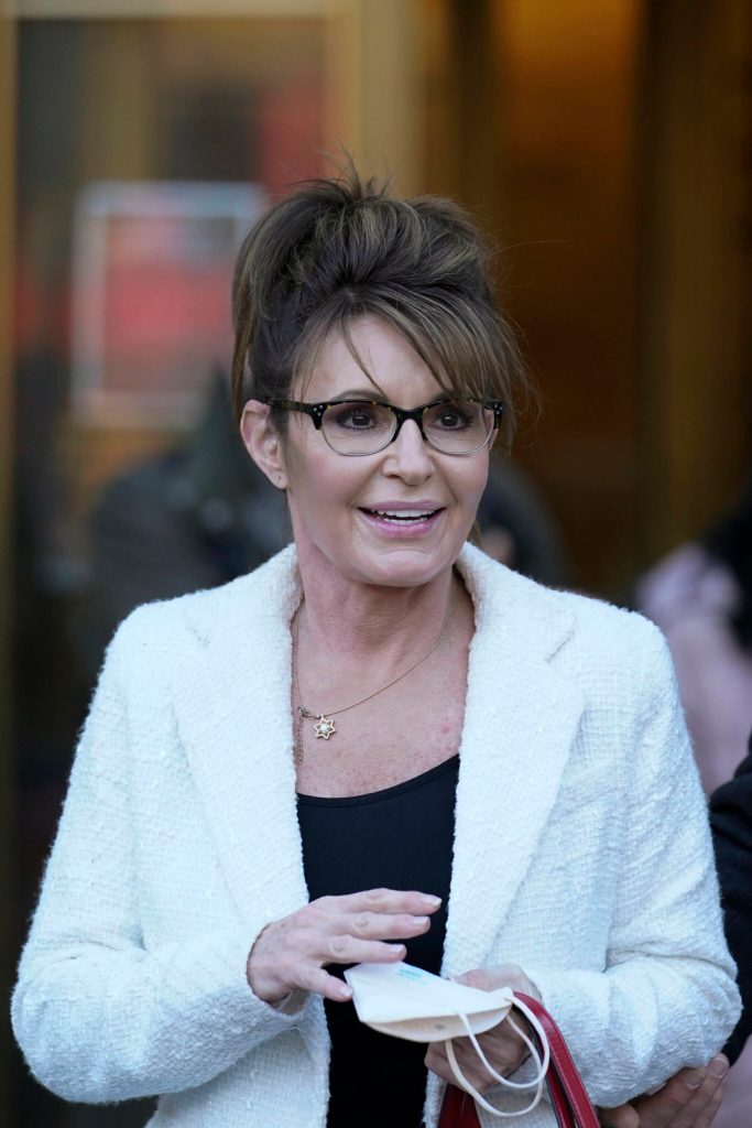 Sarah Palin leaves the courthouse in New York, Thursday, Feb. 10, 2022. Former Alaska Gov. Sarah Palin told a jury Thursday she felt like she was at the mercy of a “Goliath” when she first learned a 2017 New York Times editorial suggested her campaign rhetoric helped incite a mass shooting.. (AP Photo/Seth Wenig)