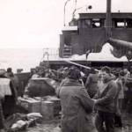 Photo from Seward Community Library Association collection in Alaska Digital Archives.
The individuals pictured here on a rescue barge are probably those plucked from the rocky beach by Jimmy Johnson and his power scow after the wreck of the S.S. Yukon in February 1946.