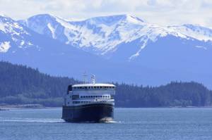 In this Empire file photo, the MV Tazlina heads in to dock in Juneau. The federal Bipartisan Infrastructure Legislation is poised to bring a lot of money to Alaska for things like ferries, but when and how much isnt yet known as many of the programs are new. (Peter Segall / Juneau Empire file)