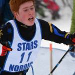 Homers Jody Goodrich finishes the boys 7.5-kilometer classic mass start Saturday, Feb. 12, 2022, at the Region III ski championshps at Tsalteshi Trails just outside of Soldotna, Alaska. (Photo by Camille Botello/Peninsula Clarion)