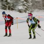 Kenai Centrals Jack Laker and Colonys Jayden Rice race in the 7.5-kilometer classic mass start at the Region III ski championships Saturday, Feb. 12, 2022, at Tsalteshi Trails just outside of Soldotna, Alaska. (Photo by Camille Botello/Peninsula Clarion)