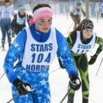 Soldotna's Jordan Ruffner starts the girls 5-kilometer classic mass start race Saturday, Feb. 12, 2022, at the Region III ski championships at Tsalteshi Trails just outside of Soldotna, Alaska. (Photo by Camille Botello/Peninsula Clarion)