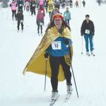 Katrina Olson leads a pack of skiers at the Ski for Women on Sunday, Feb. 13, 2022, at Tsalteshi Trails just outside of Soldotna, Alaska. (Photo by Jeff Helminiak/Peninsula Clarion)
