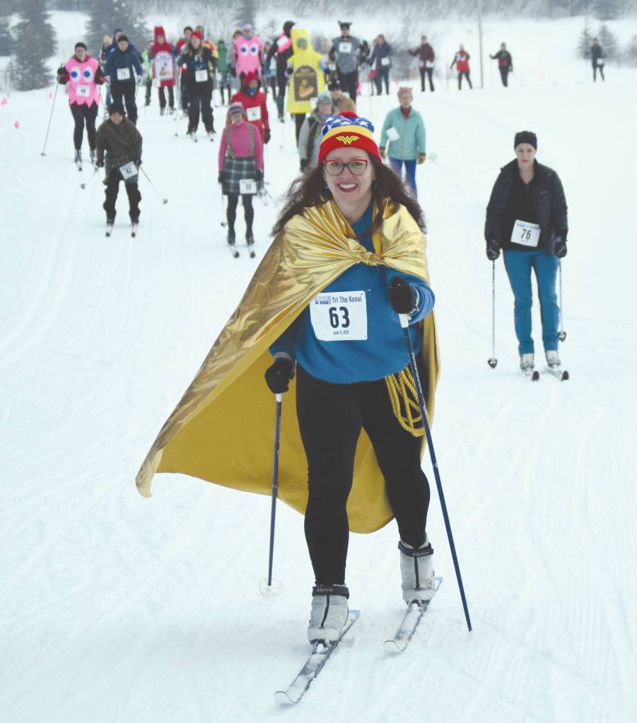 Katrina Olson leads a pack of skiers at the Ski for Women on Sunday, Feb. 13, 2022, at Tsalteshi Trails just outside of Soldotna, Alaska. (Photo by Jeff Helminiak/Peninsula Clarion)