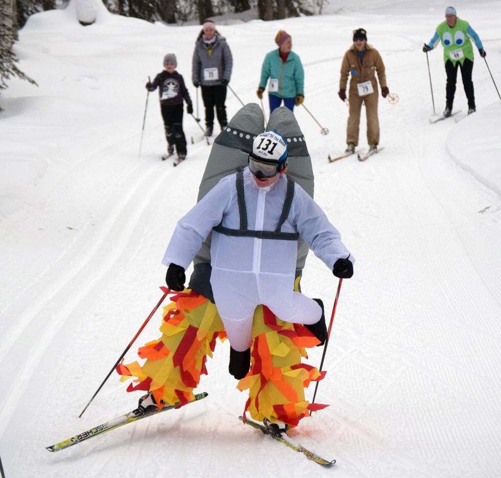 DAnna Ham rockets up a hill at the Ski for Women on Sunday, Feb. 13, 2022, at Tsalteshi Trails just outside of Soldotna, Alaska. (Photo by Jeff Helminiak/Peninsula Clarion)