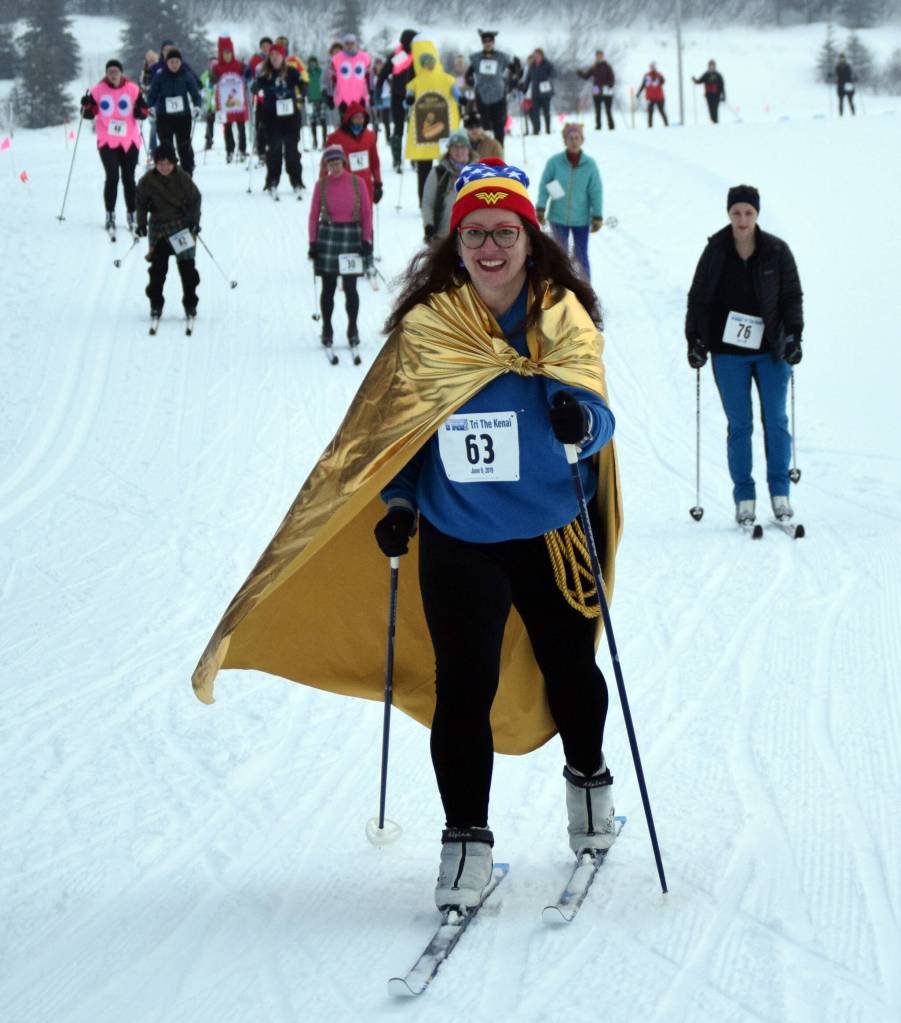 Katrina Olson leads a pack of skiers at the Ski for Women on Sunday, Feb. 13, 2022, at Tsalteshi Trails just outside of Soldotna, Alaska. (Photo by Jeff Helminiak/Peninsula Clarion)