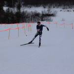 Ian McCarthy finishes in first place for the mens 40K freestyle race at the Tour of Tsalteshi on Sunday, Feb. 20, 2022. (Camille Botello/Peninsula Clarion)