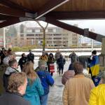 Viktor Tkachenko, who moved to Alaska from Ukraine last year, speaks during a protest against the Russian invasion of Ukraine in Marine Park on Feb. 26, 2022. (Michael S. Lockett / Juneau Empire)