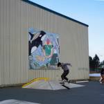 A group of young people try out the thawed skate park on Monday, Feb. 28, 2022, at the Homer Education and Recreation Complex in Homer, Alaska. The Homer City Council met Monday and heard a report by Stantec staff on a proposed design for a new community center to go on the HERC site. The design includes a skate park. (Photo by Michael Armstrong/Homer News)