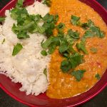 Curried lentils are served with basmati rice and garnished with cilantro. (Photo by Tressa Dale/Peninsula Clarion)