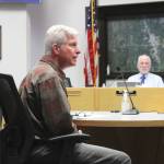 Soldotna Director of Economic Development and Planning John Czarnezki describes a plan for more parking in downtown Soldotna during a meeting of the Soldotna City Council on Wednesday, March 9, 2022, in Soldotna, Alaska. (Ashlyn OHara/Peninsula Clarion)