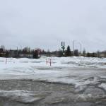 Snow collects in a lot near the Aspen Hotel on Thursday, March 10, 2022 in Soldotna, Alaska. The area will be the site of a new parking lot planned by the City of Soldotna. (Ashlyn OHara/Peninsula Clarion)