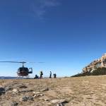 The author unloading helicopter H551 on Mt. Hoffman, Yosemite National Park. (Photo by NPS)