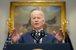 President Joe Biden announces that along with the European Union and the Group of Seven countries, the U.S. will move to revoke most favored nation trade status for Russia over its invasion of Ukraine, Friday, March 11, 2022, in the Roosevelt Room at the White House in Washington. (AP Photo/Andrew Harnik)