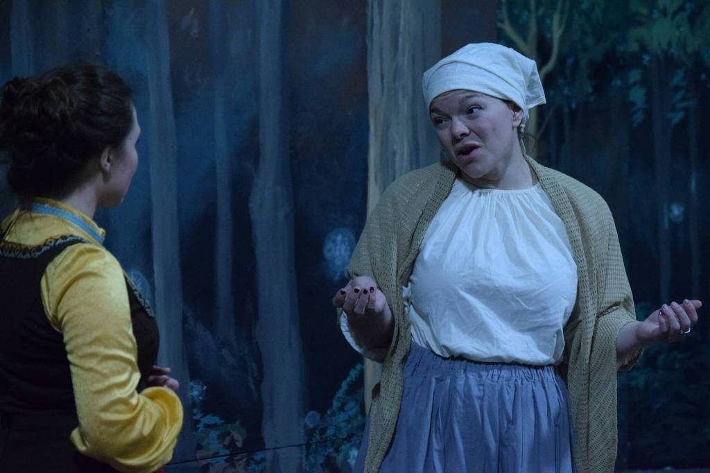 Selia Butler (left) and Kelsey Short act as their Into the Woods characters  the Bakers Wife and Cinderella  at the Kenai Performers building in Soldotna, Alaska, on Monday, March 14, 2022. (Camille Botello/Peninsula Clarion)