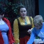 Charli Byrd (left) and Selia Butler, who play Little Red Ridinghood and the Bakers Wife in Into the Woods, run through voice exercises with vocal director Rosemary Bird at the Kenai Performers building in Soldotna, Alaska, on Monday, March 14, 2022. (Camille Botello/Peninsula Clarion)