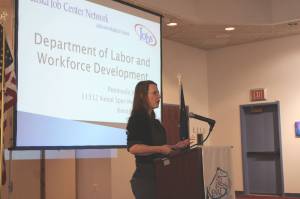 Sara Bieber, who supervises the Peninsula Job Center for the Alaska Department of Labor and Workforce Development, presents during a joint chamber of commerce luncheon at the Kenai Chamber of Commerce and Visitor Center on Wednesday, March 16, 2022 in Kenai, Alaska. (Ashlyn OHara/Peninsula Clarion)