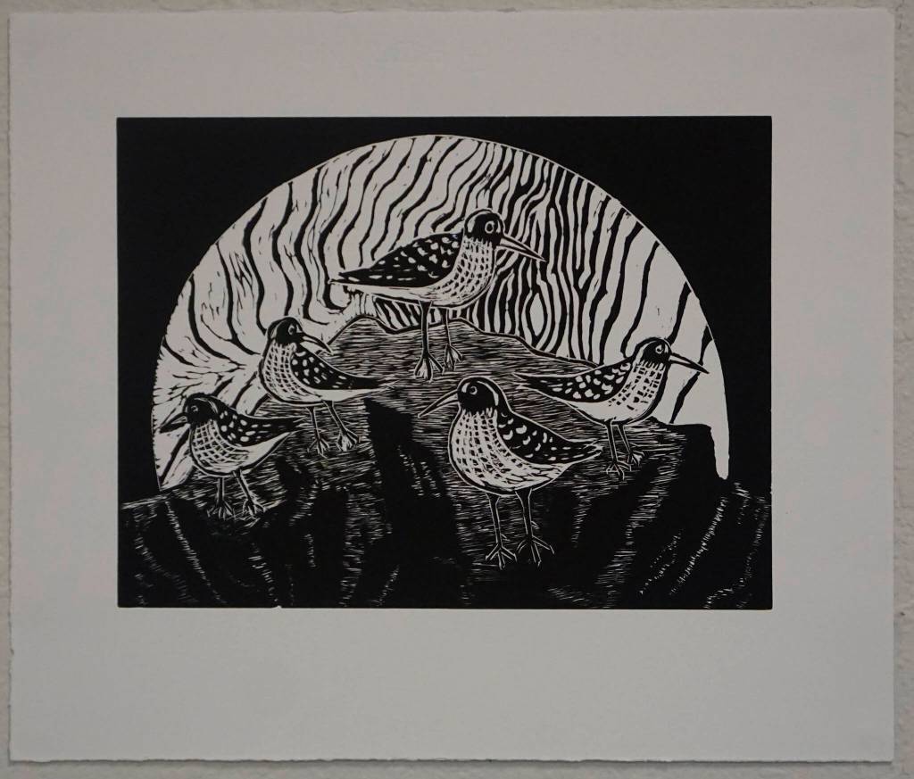 Selected Works and Sketches by Gaye Wolfe, showing at the Homer Council on the Arts through March, includes this print of shorebirds. (Photo by Michael Armstrong/Homer News)