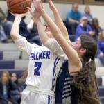 Soldotnas Ellie Burns reaches for a block on Palmers Paige Marshall during a loss to Palmer in the first round of the Northern Lights Conference tournament Thursday, March 17, 2022, at Palmer High School in Palmer, Alaska. (Photo by Ron Jones/matsusports.net)