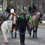 Community members participate in the St. Patricks Parade in Soldotna on March 17, 2022. (Camille Botello/Peninsula Clarion)