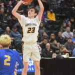 Iukah Kalugin takes a shot against Metlakatla during the 2A state basketball championship game at the Alaska Airlines Center in Anchorage, Alaska on Saturday, March 19, 2022. (Camille Botello/Peninsula Clarion)