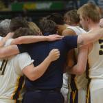 The Ninilchik Wolverines win the Class 2A state basketball championship game at the Alaska Airlines Center in Anchorage, Alaska, on Saturday, March 19, 2022. (Camille Botello/Peninsula Clarion)