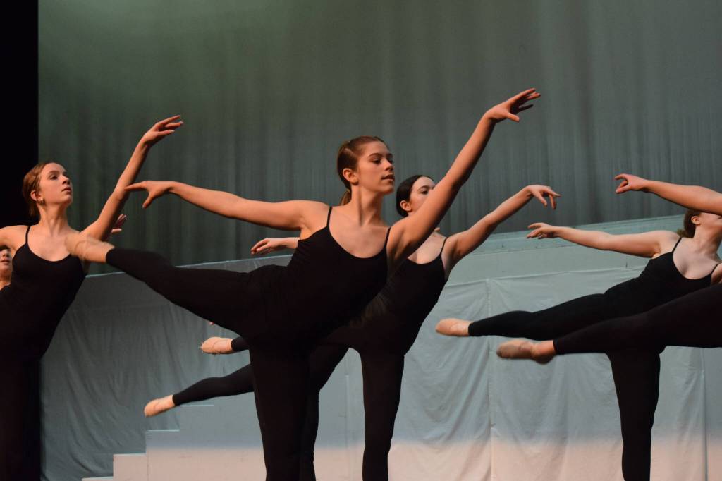 Performers prepare for the Forever Dance company showcase Among Dreams during a rehearsal on Tuesday, March 22, 2022, at the Renee C. Henderson Auditorium in Kenai, Alaska. (Camille Botello/Peninsula Clarion)