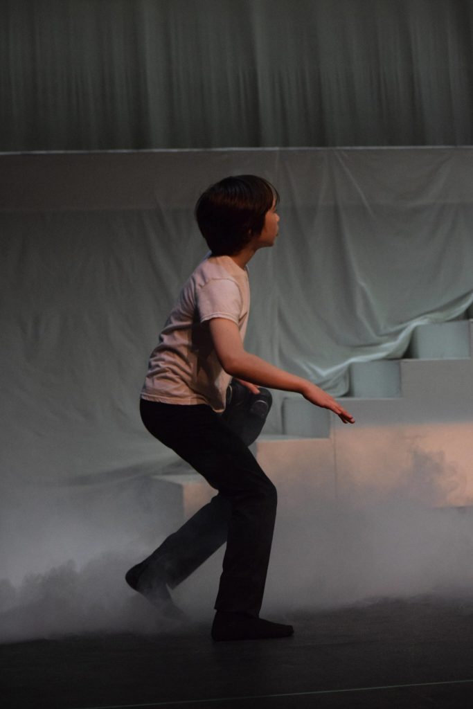 A performer prepares for the Forever Dance company showcase Among Dreams during a rehearsal on Tuesday, March 22, 2022, at the Renee C. Henderson Auditorium in Kenai, Alaska. (Camille Botello/Peninsula Clarion)