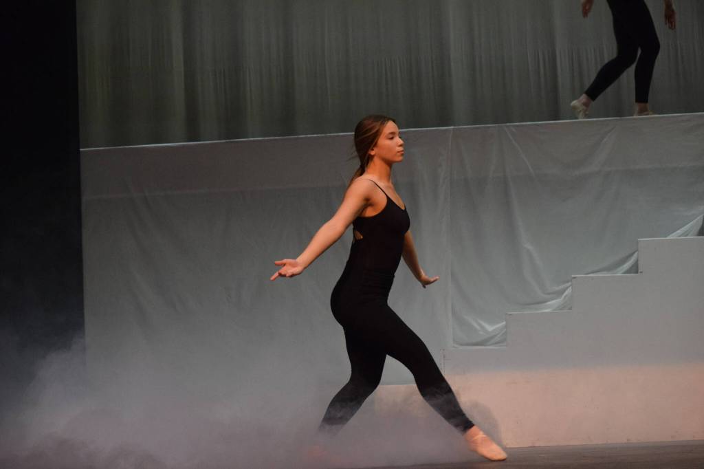 Isabella Valenzuela prepares for the Forever Dance company showcase Among Dreams during a rehearsal on Tuesday, March 22, 2022 at the Renee C. Henderson Auditorium in Kenai, Alaska. (Camille Botello/Peninsula Clarion)