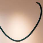 Lost at Sea or Wishbone with a Beard is a piece by Bunnell Street Arts Center artist-in-residence Berith Stennabb inspired by Exxon Valdez Oil Spill oil containment booms.