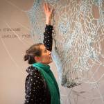 Bunnell Street Arts Center visiting artist-in-residence Berith Stennabb poses next to one of her pieces, Anomicholistic ar.35. (Photo by Sean McDermott)