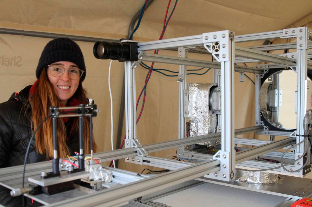 This Feb. 16, 2022, photo shows Sarah Johnson, a graduate student and researcher at the University of California, Los Angeles, with an instrument measures trace gases or pollutants at different heights in the atmosphere in Fairbanks, Alaska. Over seven weeks this winter, nearly 50 scientists from the continental U.S. and Europe descended on Fairbanks to study the sources of air pollution, how they interact in the citys cold and dark climate and to come up with a list of best practices for others across the circumpolar north struggling to get a breath of fresh air. (AP Photo/Mark Thiessen)