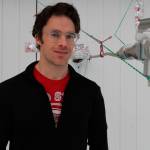 This Feb. 16, 2022, photo shows Ellis Robinson, a a post-doctoral researcher at Johns Hopkins University in Baltimore, with an air intake instrument that helps measure air pollution at a home in Fairbanks, Alaska. Over seven weeks this winter, nearly 50 scientists from the continental U.S. and Europe descended on Fairbanks to study the sources of air pollution, how they interact in the citys cold and dark climate and to come up with a list of best practices for others across the circumpolar north struggling to get a breath of fresh air. (AP Photo/Mark Thiessen)