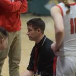 Kenai coach Jeff Swick calls a timeout during the Class 3A girls basketball fourth-place semifinals at the Alaska Airlines Center in Anchorage, Alaska, on Thursday, March 24, 2022. (Camille Botello/Peninsula Clarion)