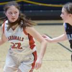 Kenai Central's Emilee Wilson drives past Valdez's Ambrosia Woodgate during the Class 3A girls basketball fourth-place semifinals at the Alaska Airlines Center in Anchorage, Alaska, on Thursday, March 24, 2022. (Camille Botello/Peninsula Clarion)