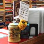 Ashlyn OHara/Peninsula Clarion 
A teapot holds crocheted sunflowers at Already Read bookstore on Thursday in Kenai.