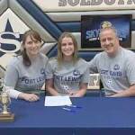 Soldotna senior Rhys Cannava, with parents Joe and Dana Cannava, signs her National Letter of Intent on Tuesday, April 5, 2022, at Soldotna High School in Soldotna, Alaska. (Photo provided)