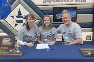 Soldotna senior Rhys Cannava, with parents Joe and Dana Cannava, signs her National Letter of Intent on Tuesday, April 5, 2022, at Soldotna High School in Soldotna, Alaska. (Photo provided)