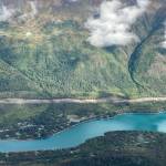 An area cleared to make way for the Cooper Landing Bypass project can be seen above the intersection of the Kenai River and Kenai Lake in Cooper Landing, Alaska, on Sept. 6, 2021. (Photo by Jeff Helminiak/Peninsula Clarion)