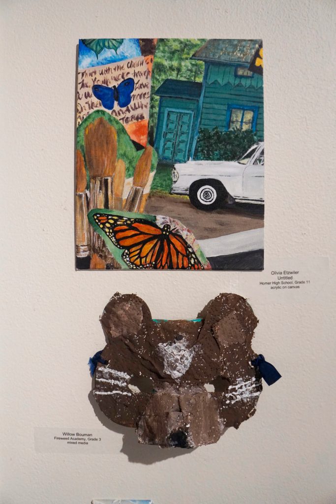 Grade 11 Homer High School student Olivia Etzwilers Untitled, is at top, and grade 3 Fireweed Academy student Willow Boumans mask is at bottom. (Photo by Michael Armstrong/Homer News)