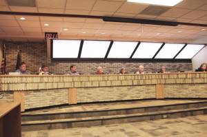 Members of the Kenai City Council participate in a council meeting on Wednesday, March 16, 2022, in Kenai, Alaska. (Ashlyn OHara/Peninsula Clarion)